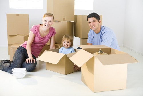 Moving team protecting furniture during a Canary Wharf van service
