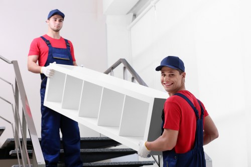 Careful loading of furniture during a Canary Wharf property collection