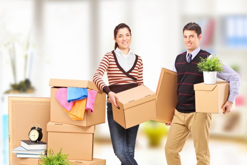 Man and van service moving items in Canary Wharf with local urban surroundings