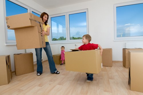 Packed boxes and furniture prepared for a local house removal service