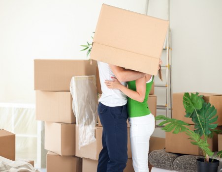 Professional movers loading boxes for a Canary Wharf relocation