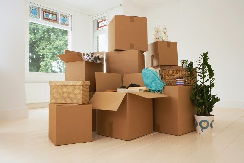 Careful loading of sofas and household furniture for transport in Canary Wharf